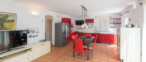 Villa | Private kitchen | Fridge, microwave, oven, stovetop