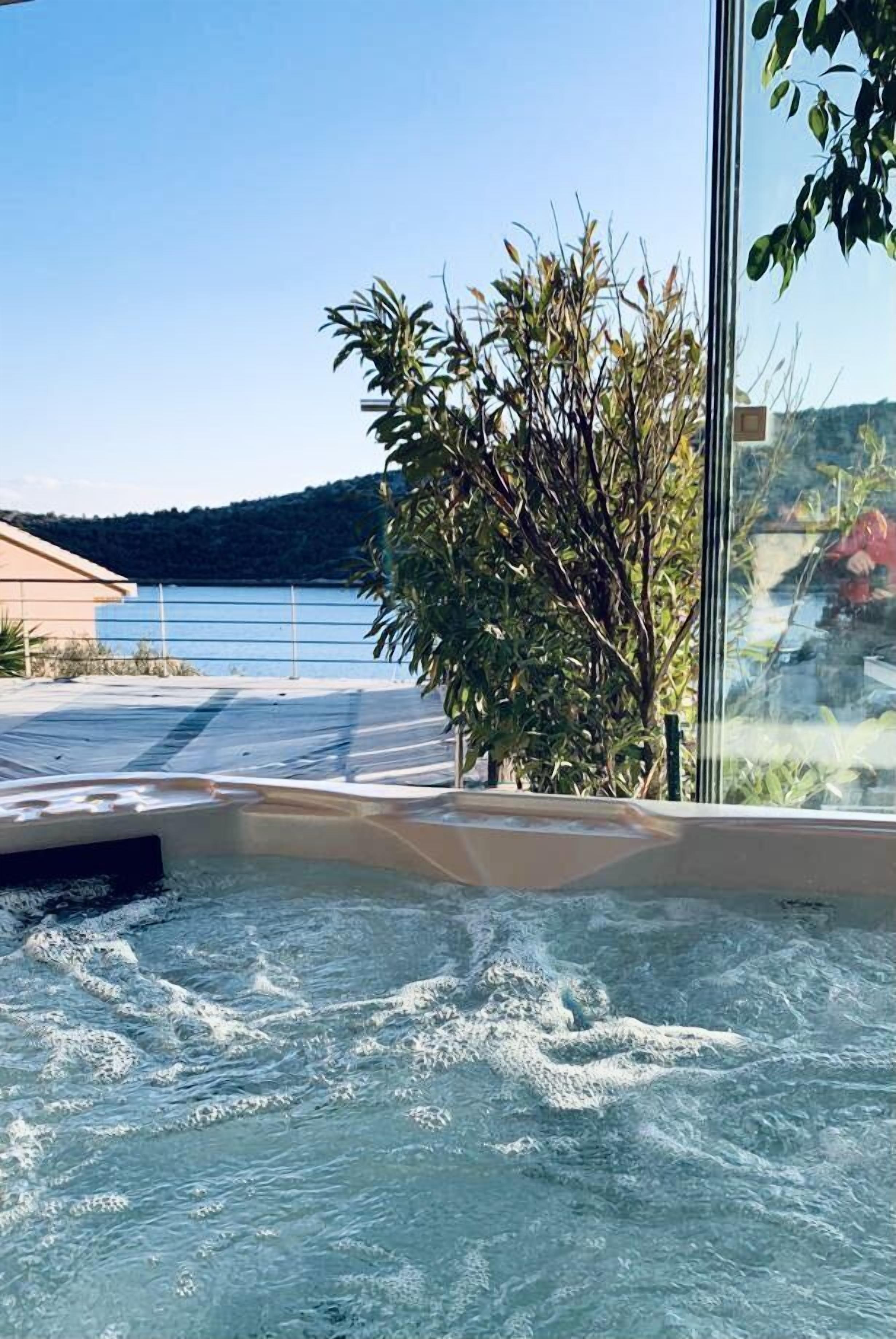 Outdoor pool, a heated pool, pool loungers