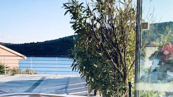 Outdoor pool, a heated pool, sun loungers