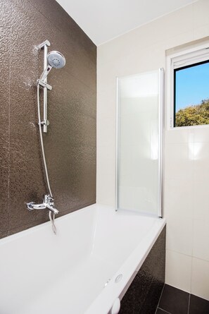 Villa | Bathroom | Shower, towels, soap, toilet paper