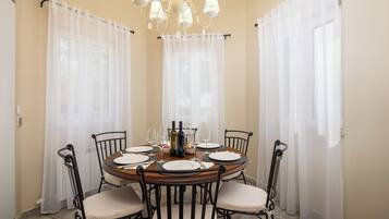 Villa | Private kitchen | Fridge, microwave, oven, stovetop