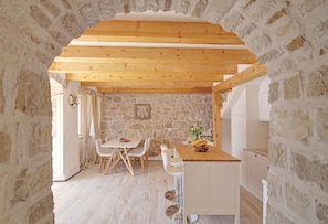 Villa | Private kitchen | Fridge, oven, stovetop, dishwasher