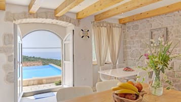 Villa | Private kitchen | Fridge, oven, stovetop, dishwasher