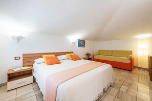 スタンダード ダブルまたはツインルーム 1 ベッドルーム | 客室ごとに異なるインテリア、ノートパソコン用作業スペース、遮光カーテン、防音設備