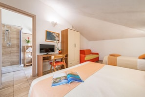 Triple Room | Individually furnished, laptop workspace, blackout drapes, soundproofing