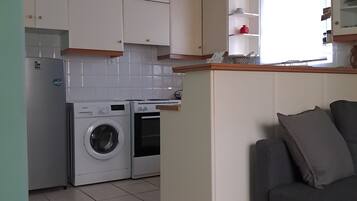 Family House, Courtyard Area (4) | Private kitchen | Mini-fridge, microwave, oven, stovetop