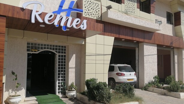 A hotel entrance with a sign reading "Rennes". - Remes hotel (Constantine)