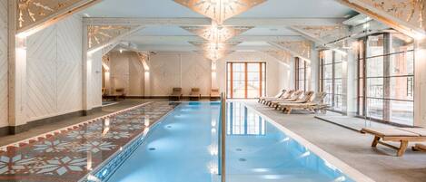 Indoor pool, open 8:00 AM to 10:00 PM, pool loungers