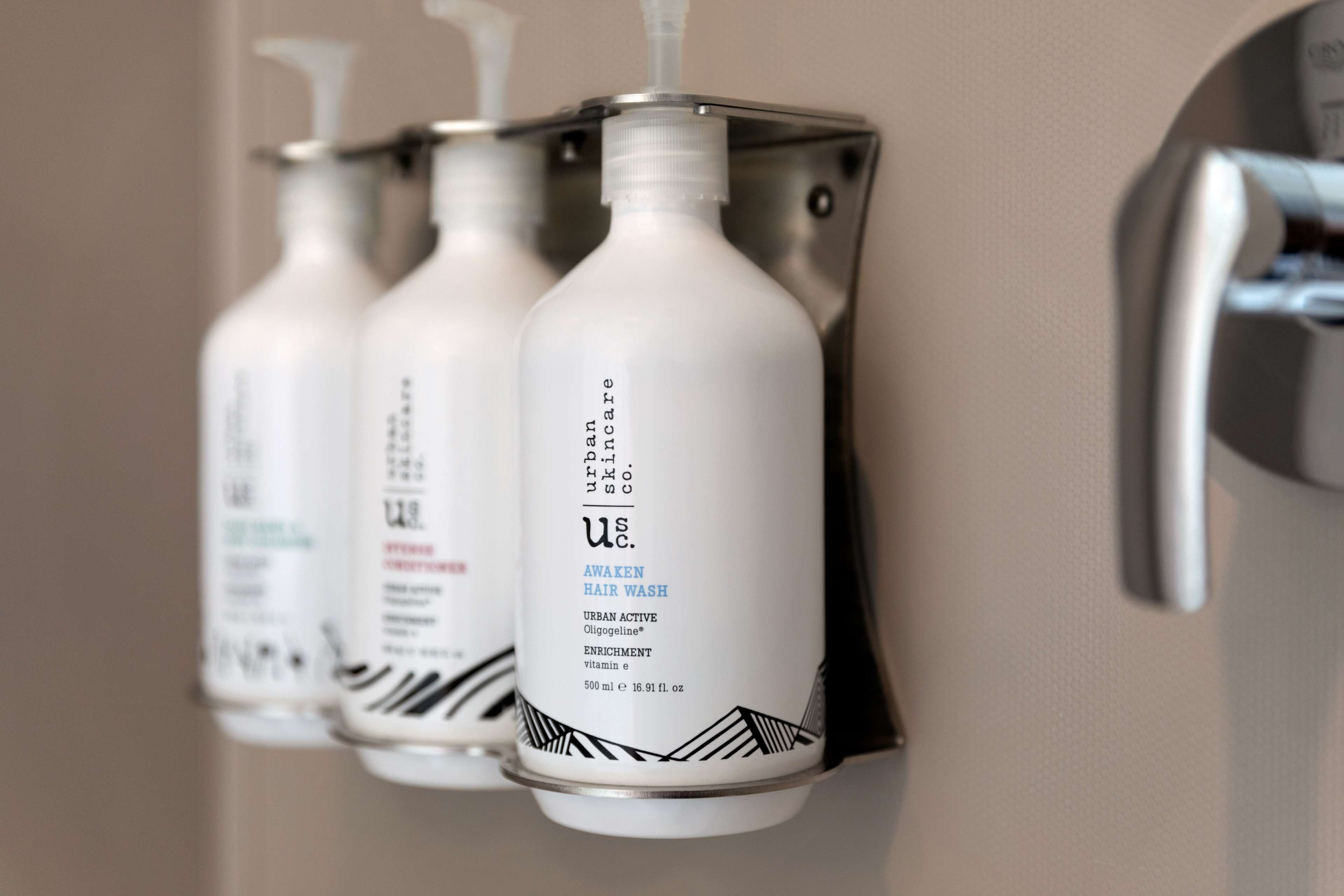 hair dryer, towels, soap, shampoo