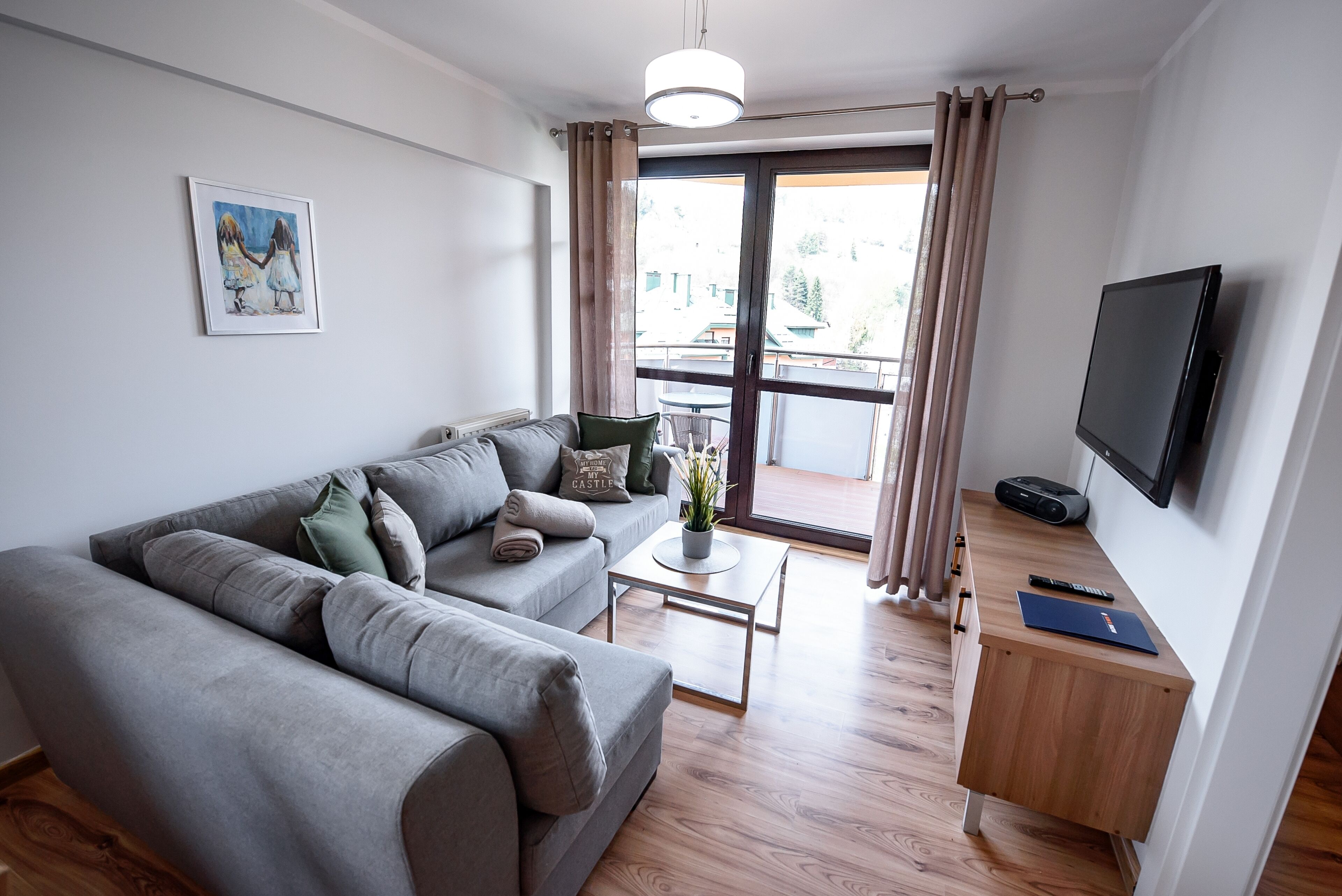 Apartment (126B) | Living area | 30-inch flat-screen TV with cable channels, TV, DVD player