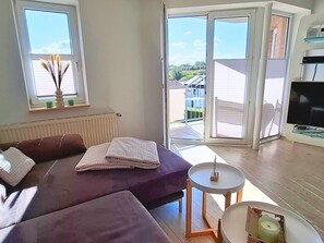 TV - Vacation apartment Meerliebe (Brodersby)