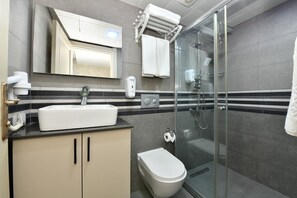 Economy Suite, Kitchenette | Bathroom