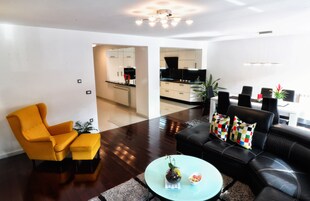 Superior Apartment, Ground Floor | Living area | Flat-screen TV