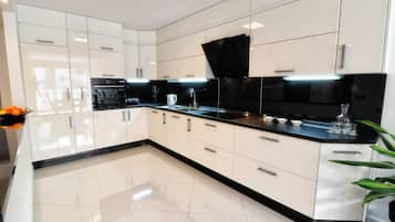 Superior Apartment, Ground Floor | Private kitchen | Fridge