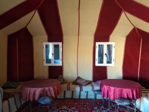 Breakfast, lunch, dinner served; local cuisine 