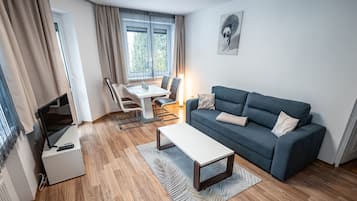Apartment (1D) | Living area | Flat-screen TV