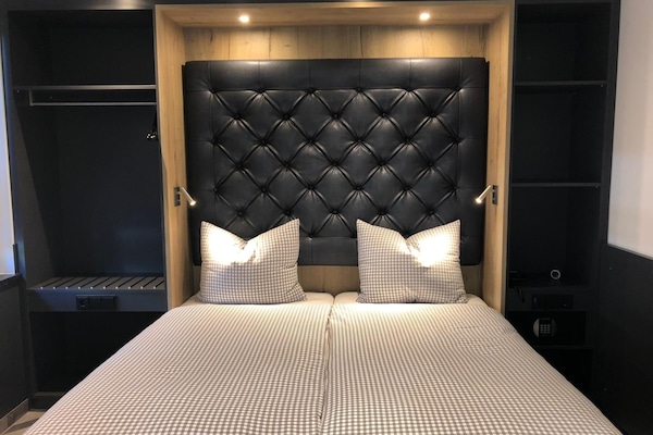 Een kluis op de kamer, geluiddichte muren, gratis wifi, beddengoed