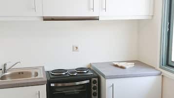 Fridge, coffee/tea maker, electric kettle, cookware/dishes/utensils