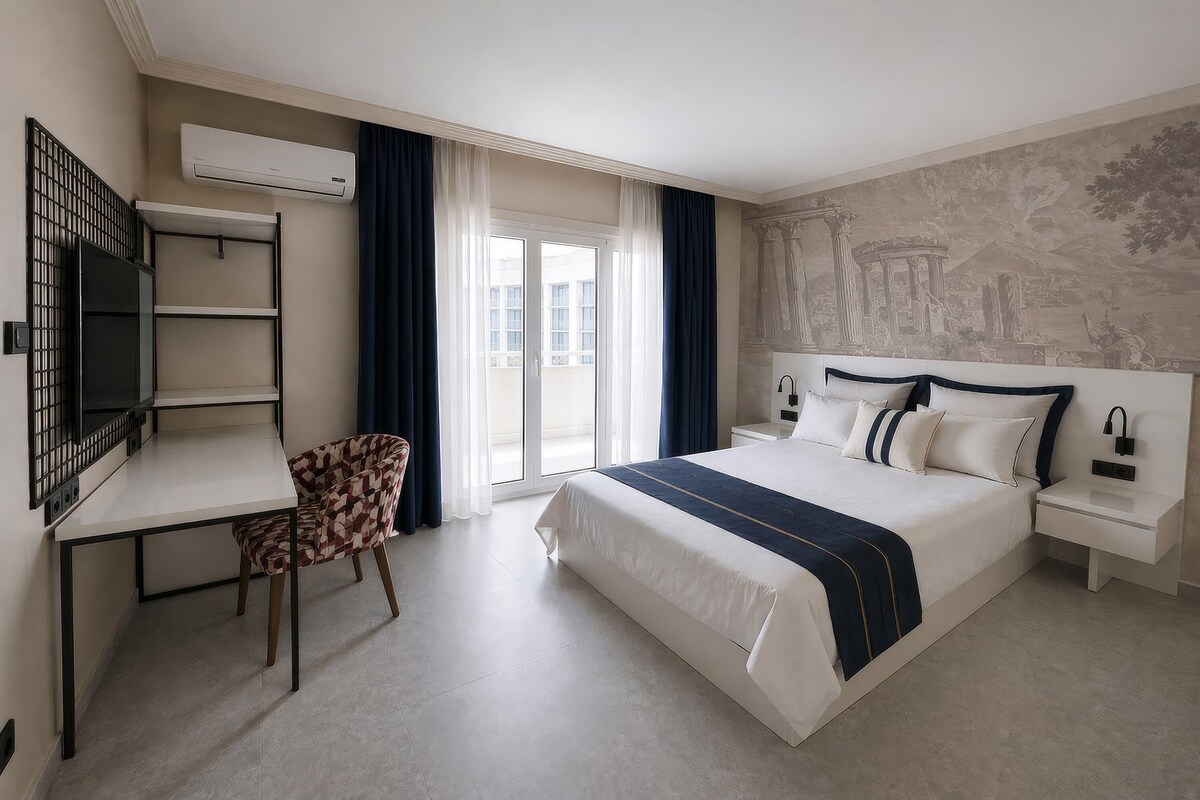 Suite junior | Minibar, sistema de insonorización, wifi gratis y ropa de cama