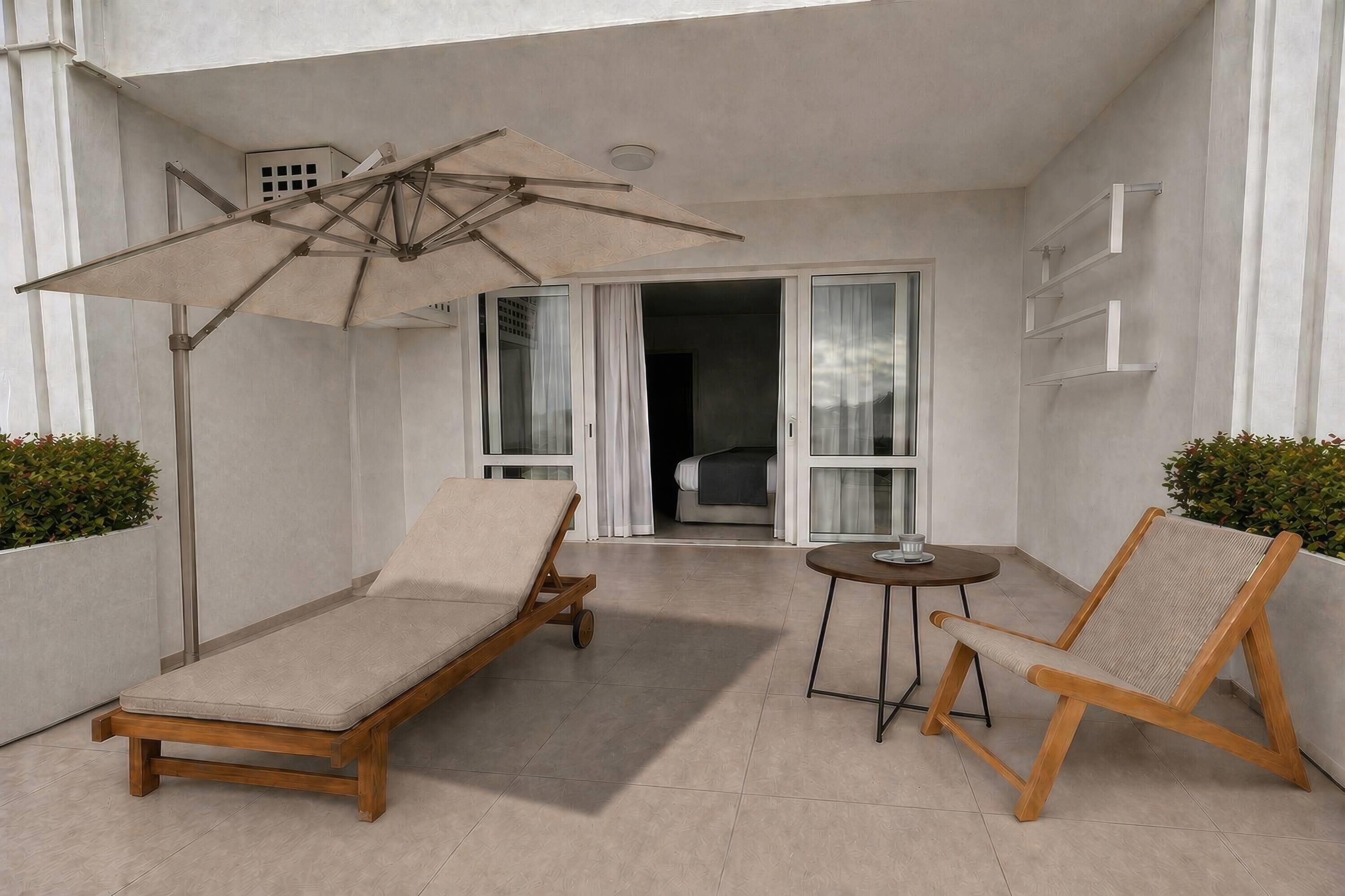 Deluxe Room, Multiple Beds, Pool View | Minibar, soundproofing, WiFi (free), bed sheets