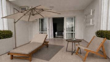Deluxe Room, Multiple Beds, Pool View | Minibar, soundproofing, WiFi (free), bed sheets