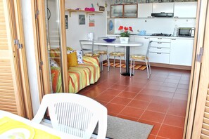Apartment, 2 Bedrooms | Living area | Flat-screen TV - Porto Rotondo Garden Flats (Olbia)