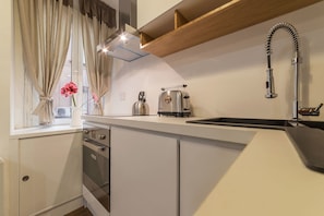Apartment, 2 Bedrooms | Private kitchen | Full-size fridge, oven, stovetop, dishwasher