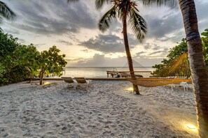 On the beach, sun-loungers, beach towels