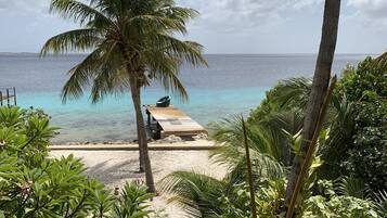 On the beach, sun loungers, beach towels