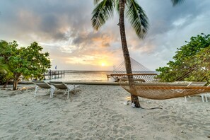 On the beach, sun loungers, beach towels