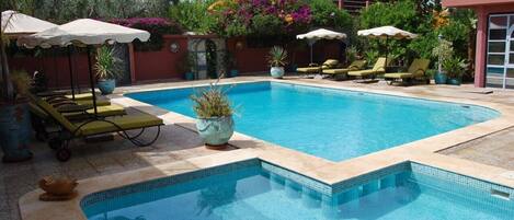 2 outdoor pools, pool umbrellas, sun loungers