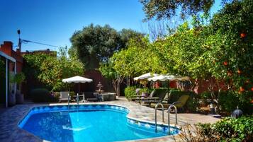 2 outdoor pools, pool umbrellas, sun loungers