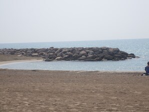 Plage, chaises longues