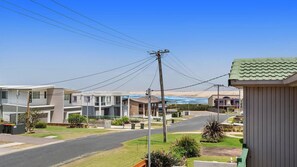 Property grounds - 1/32 Ocean Avenue - three bedrooms, three bathrooms, air con, boat parking & water views (Anna Bay)