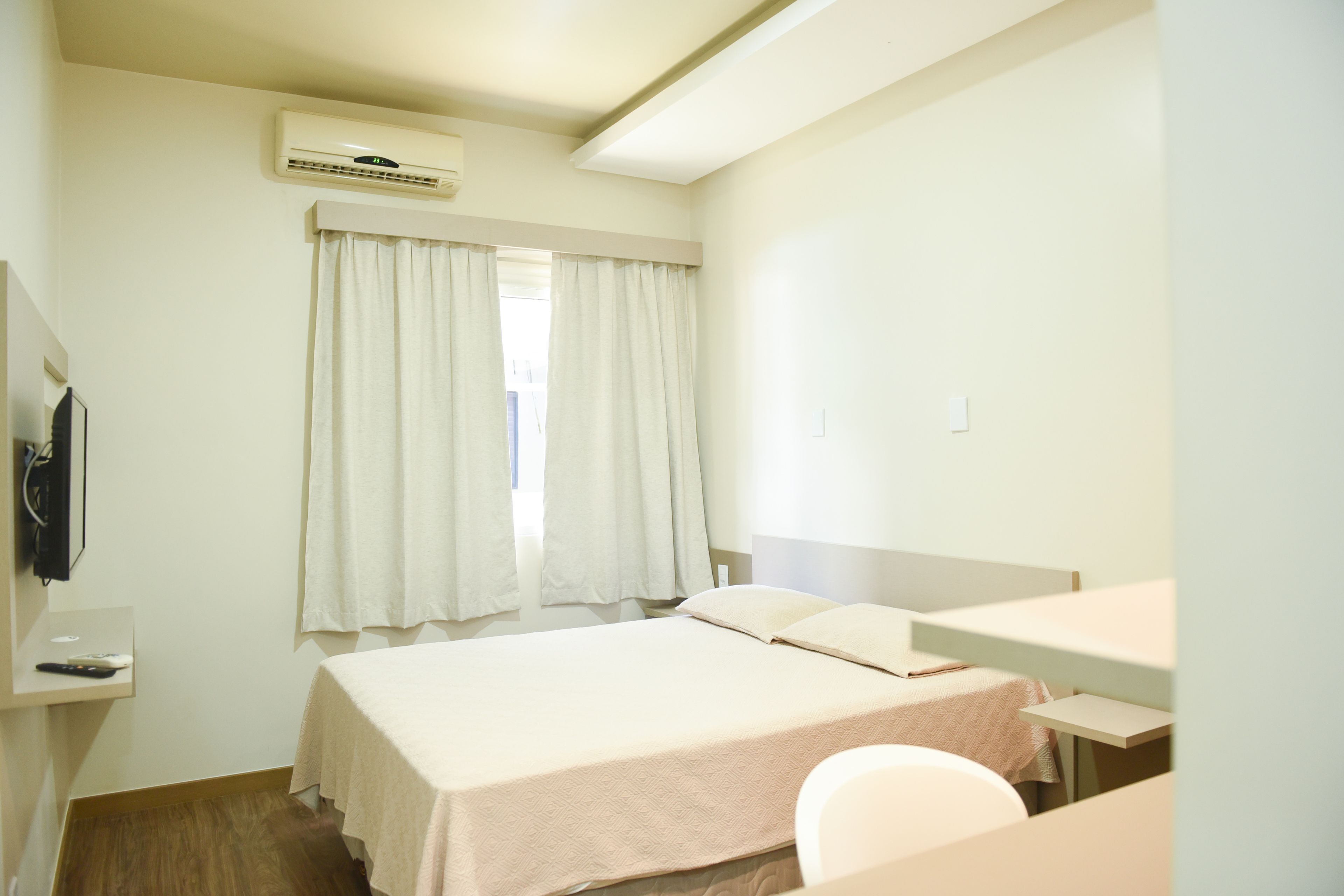 Deluxe Room, 1 Queen Bed, Non Smoking, Private Bathroom | Minibar, desk, laptop workspace, blackout drapes