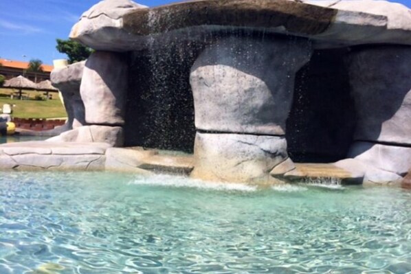 7 outdoor pools, pool umbrellas, pool loungers
