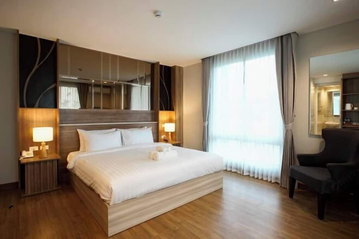 1 kamar tidur, seprai premium, minibar, dan brankas
