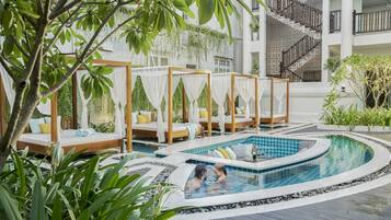 Outdoor pool, pool umbrellas, sun loungers