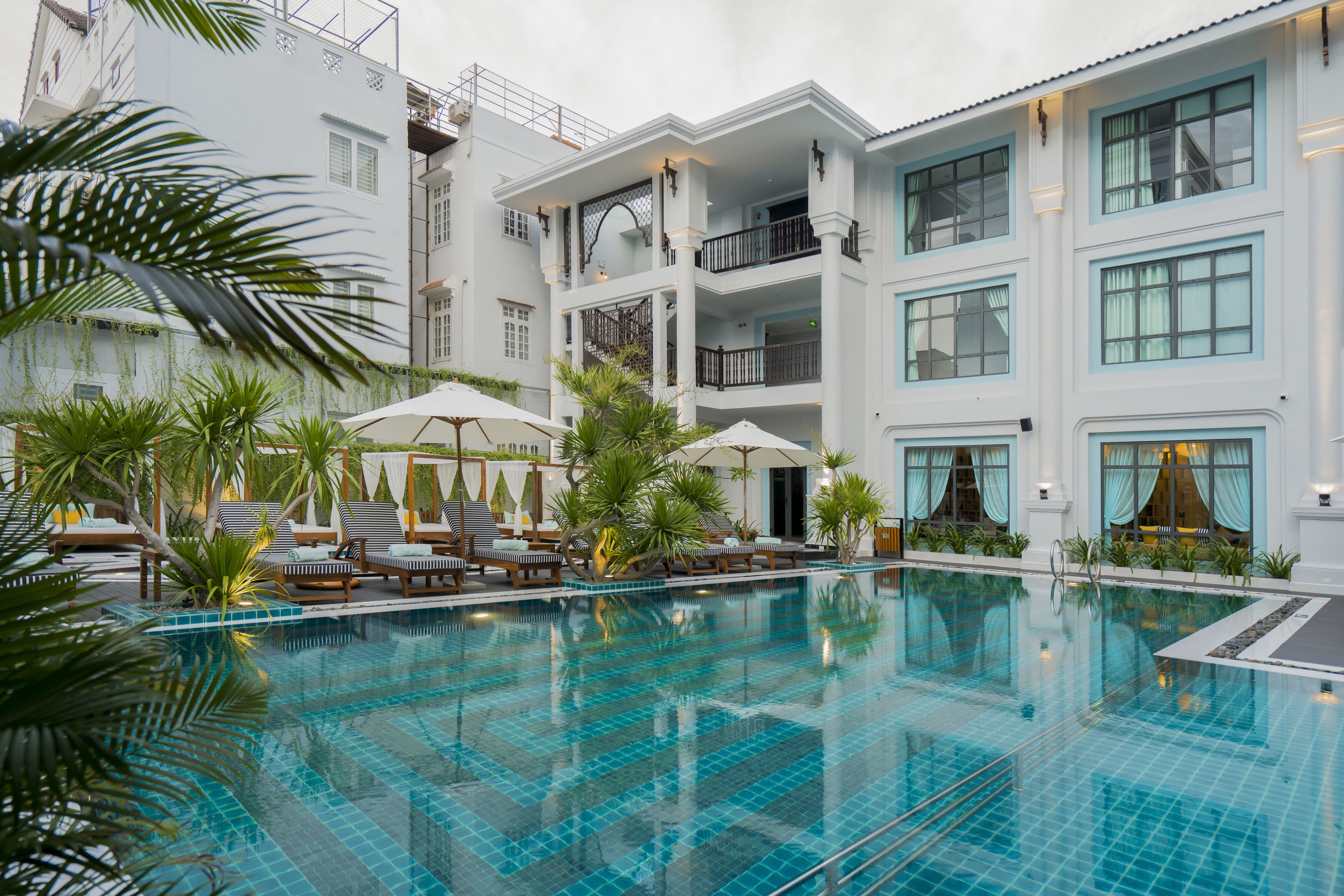 outdoor pool, pool umbrellas, pool loungers