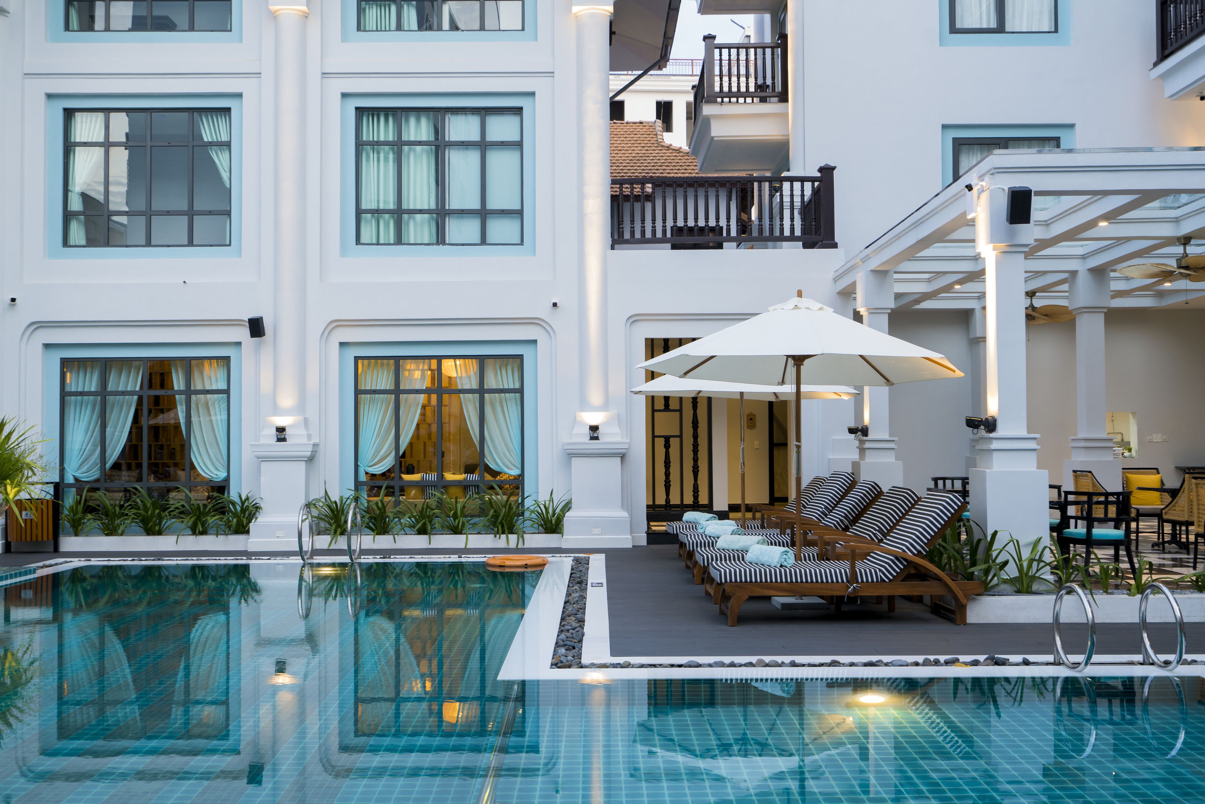 family room | pool | outdoor pool, pool umbrellas, pool loungers