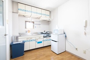 Standard-Apartment | Wohnbereich | Flachbildfernseher