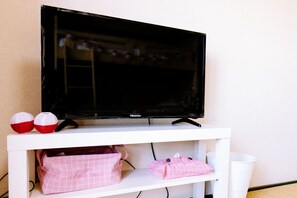 Standard-Apartment | Wohnbereich | Flachbildfernseher