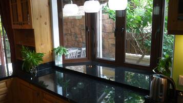 Fridge, stovetop, cookware/dishes/utensils