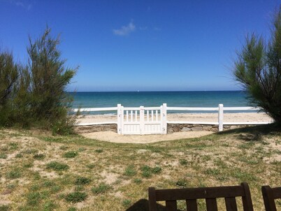 House with garden directly on the beach.