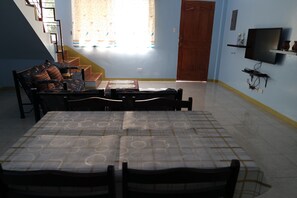 Family Apartment | Living area | 32-inch flat-screen TV with cable channels, LED TV