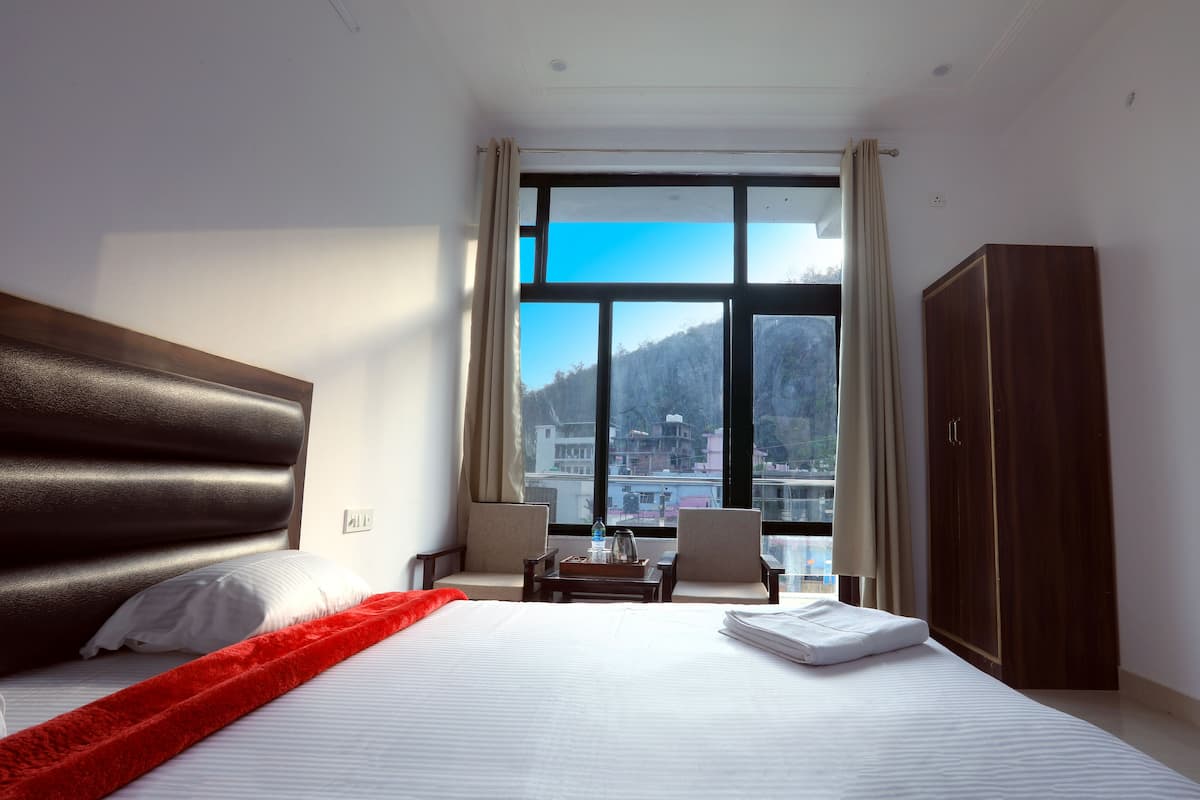 Habitación Deluxe | Escritorio, camas extra y wifi gratis