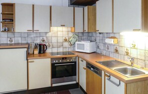 Réfrigérateur, plaque de cuisson, lave-vaisselle, cafetière/bouilloire