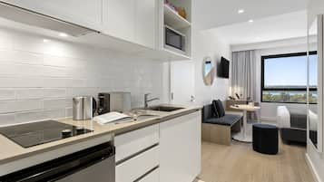 Studio | Private kitchen | Fridge, microwave, stovetop, dishwasher