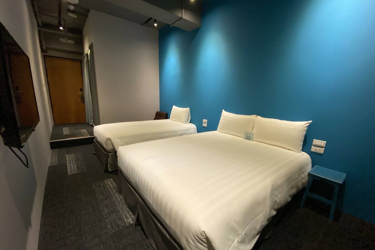 Family Triple Room, No Windows | Down comforters, minibar (free items), desk, laptop workspace