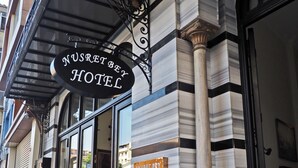 A hotel entrance with a sign reading "Nusret Bey Hotel". - Nusret Bey Hotel (Istanbul)